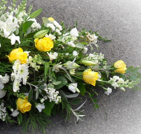 The Peaceful White Casket Spray