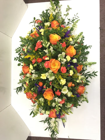 The vibrant Casket spray