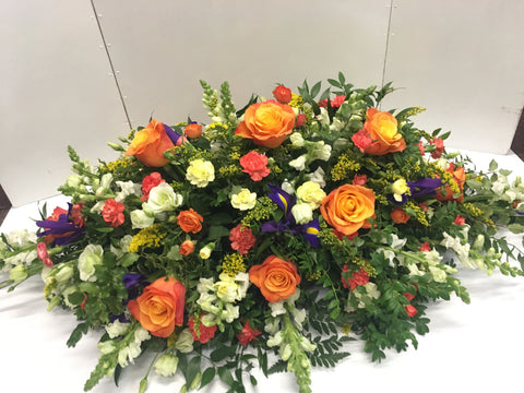 The vibrant Casket spray