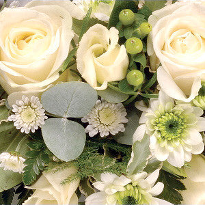 The Eco funeral casket spray with garlands