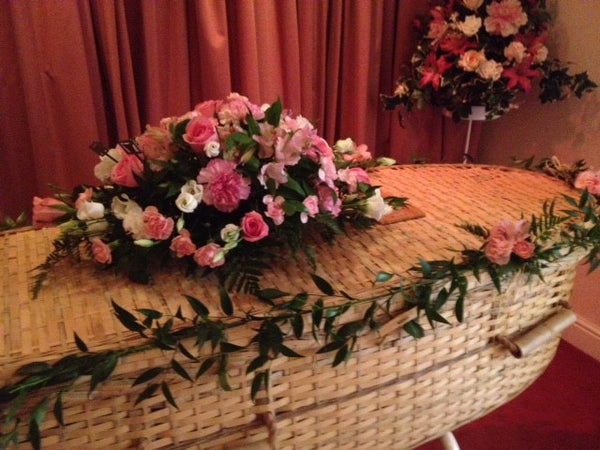 The Eco funeral casket spray with garlands